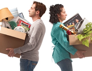 man and woman back to back each with box of otheir possessions