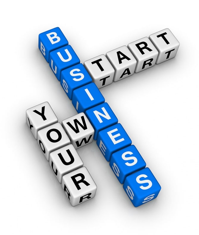 words on dice that say start your own business