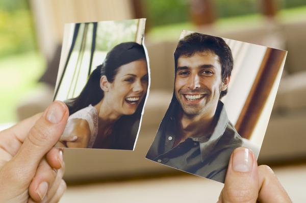 picture of man and woman smiling torn in half
